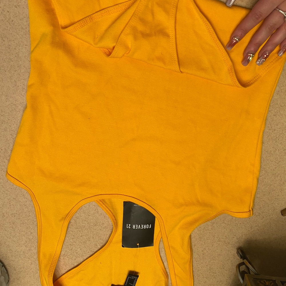 Yellow body suit